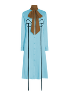 Light blue dress with a brown bow on a mannequin against a white background