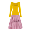 Yellow top and pink skirt on a white background