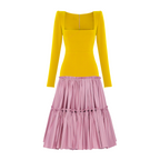 Yellow top and pink skirt on a white background