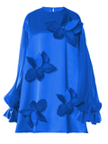 Blue dress with floral embellishments on a white background