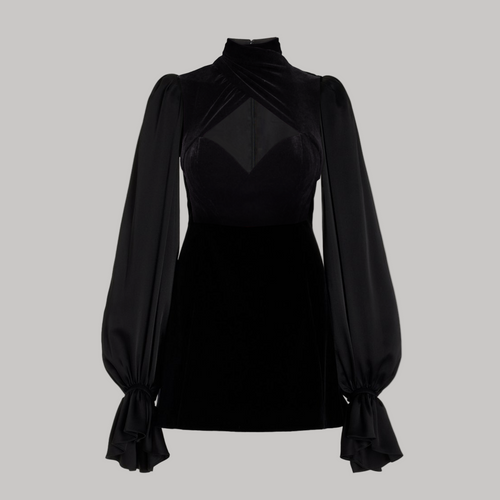 Model wearing a Maison Aria Dress