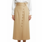 Beige skirt with button details worn by a person on a white background