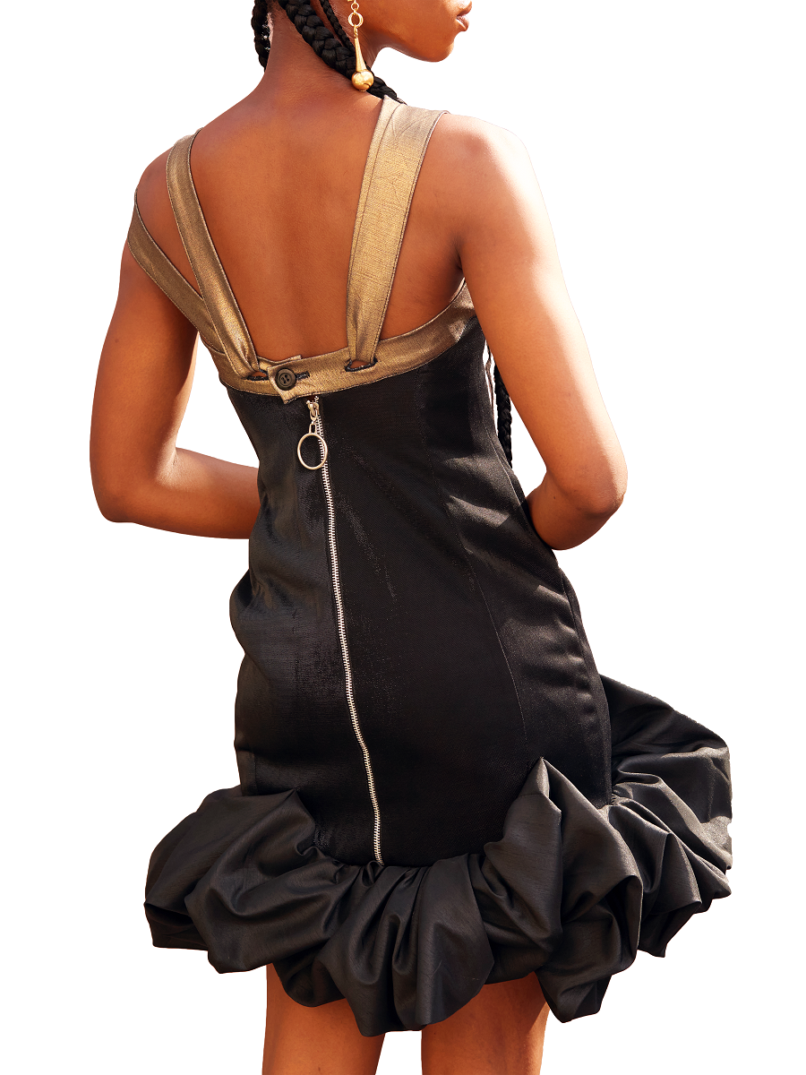 Model wearing a Maison Aria Dress