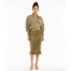 Woman wearing a green outfit on a white background