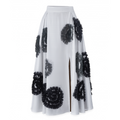 White skirt with black floral patterns on a white background