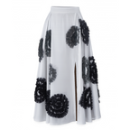 White skirt with black floral patterns on a white background