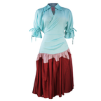 Light blue top and red skirt on a white background