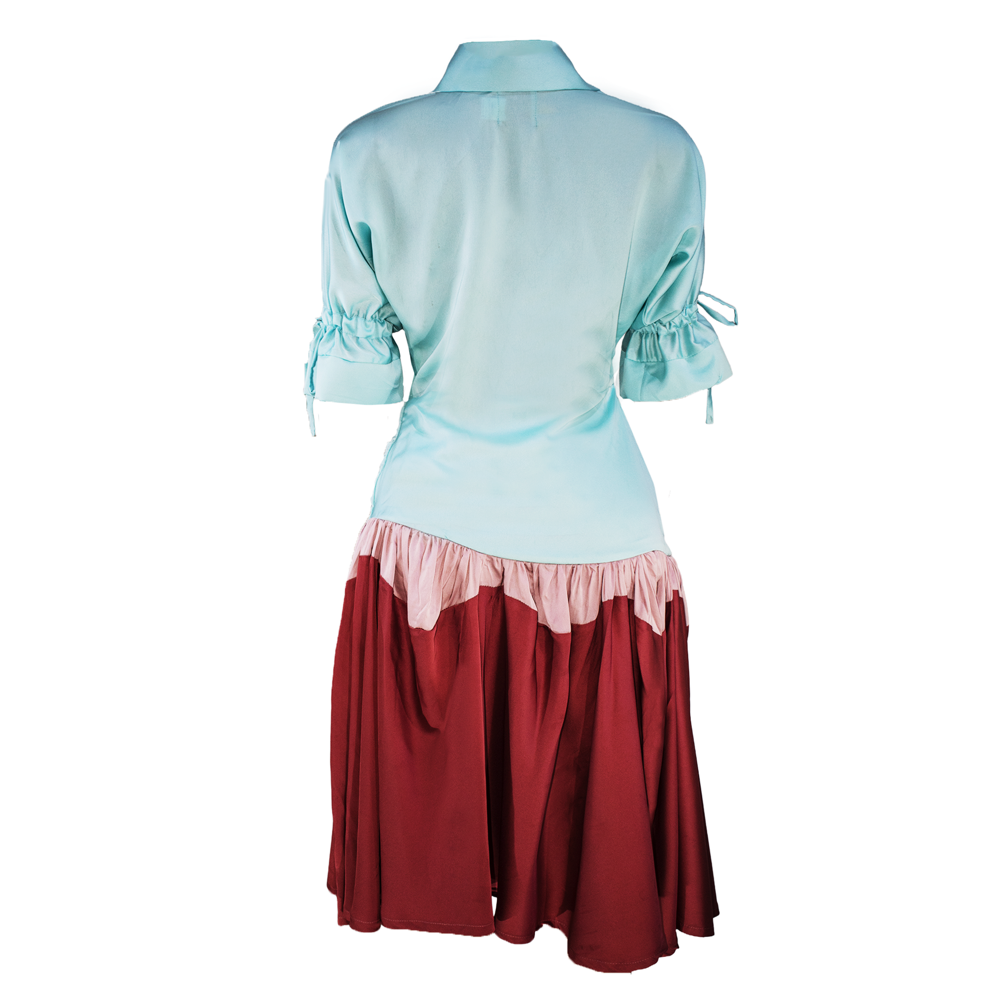 Light blue top and red skirt on a mannequin with a white background