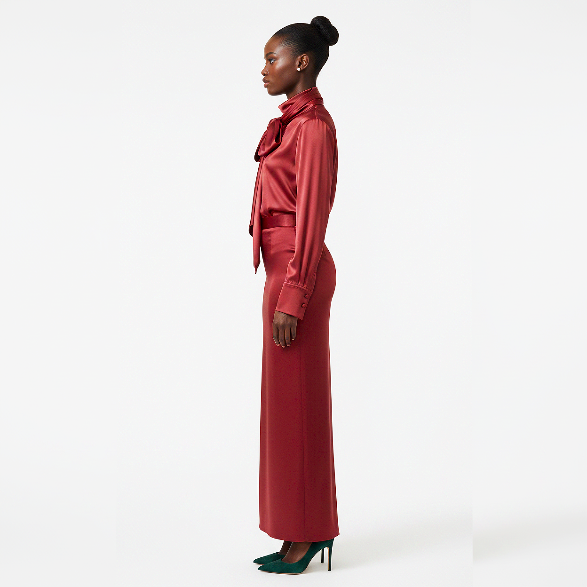 Woman wearing a red outfit with a white background