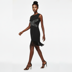 Black dress with a decorative element on a white background