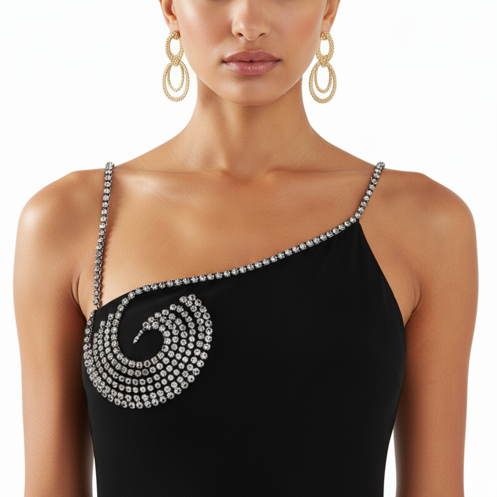 Black one-shoulder dress with intricate silver detailing worn by a model on a white background