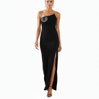 Black evening gown with a slit on a white background