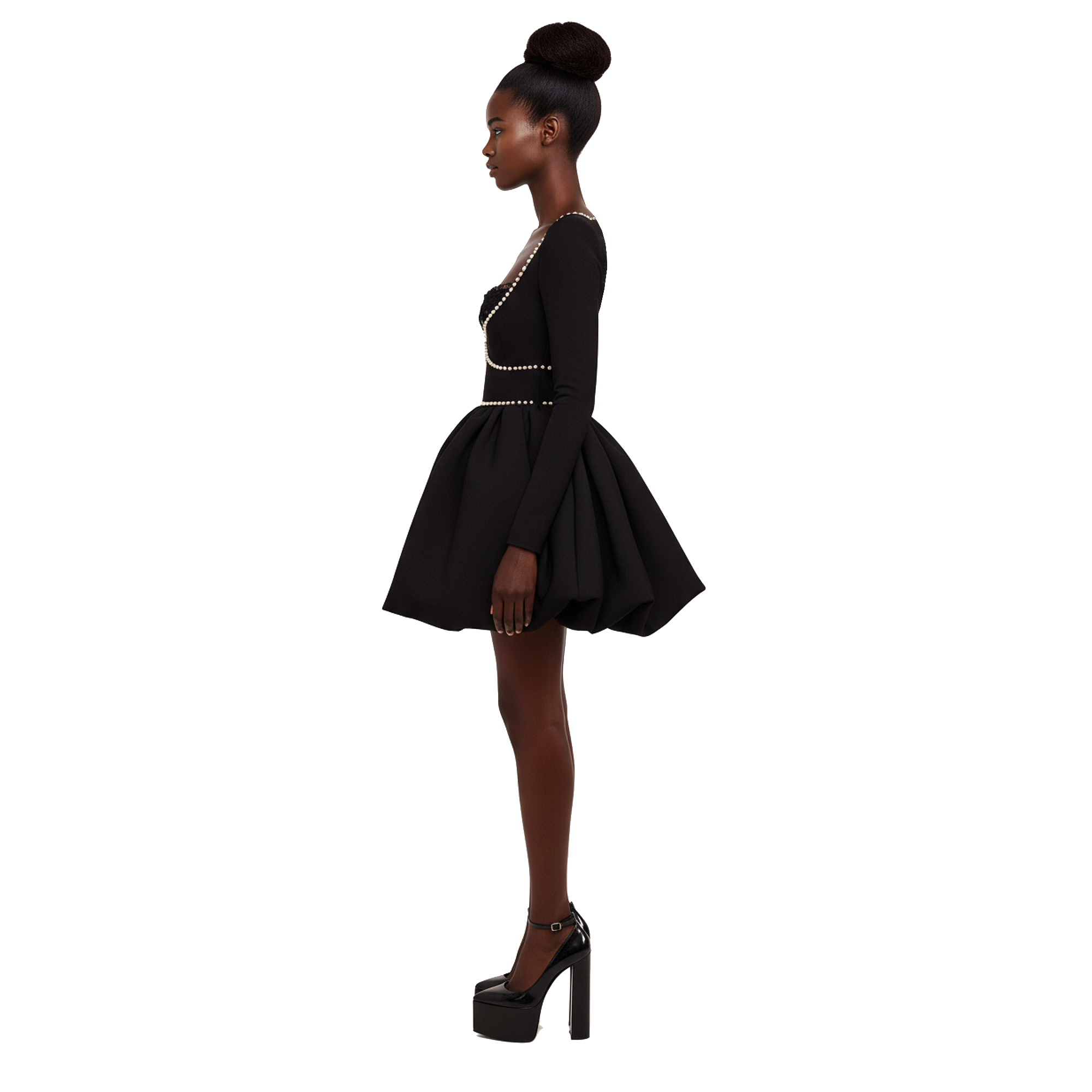Woman wearing a black dress with a white background