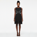Black dress with geometric patterns on a white background