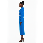 Woman wearing a blue outfit with a white background