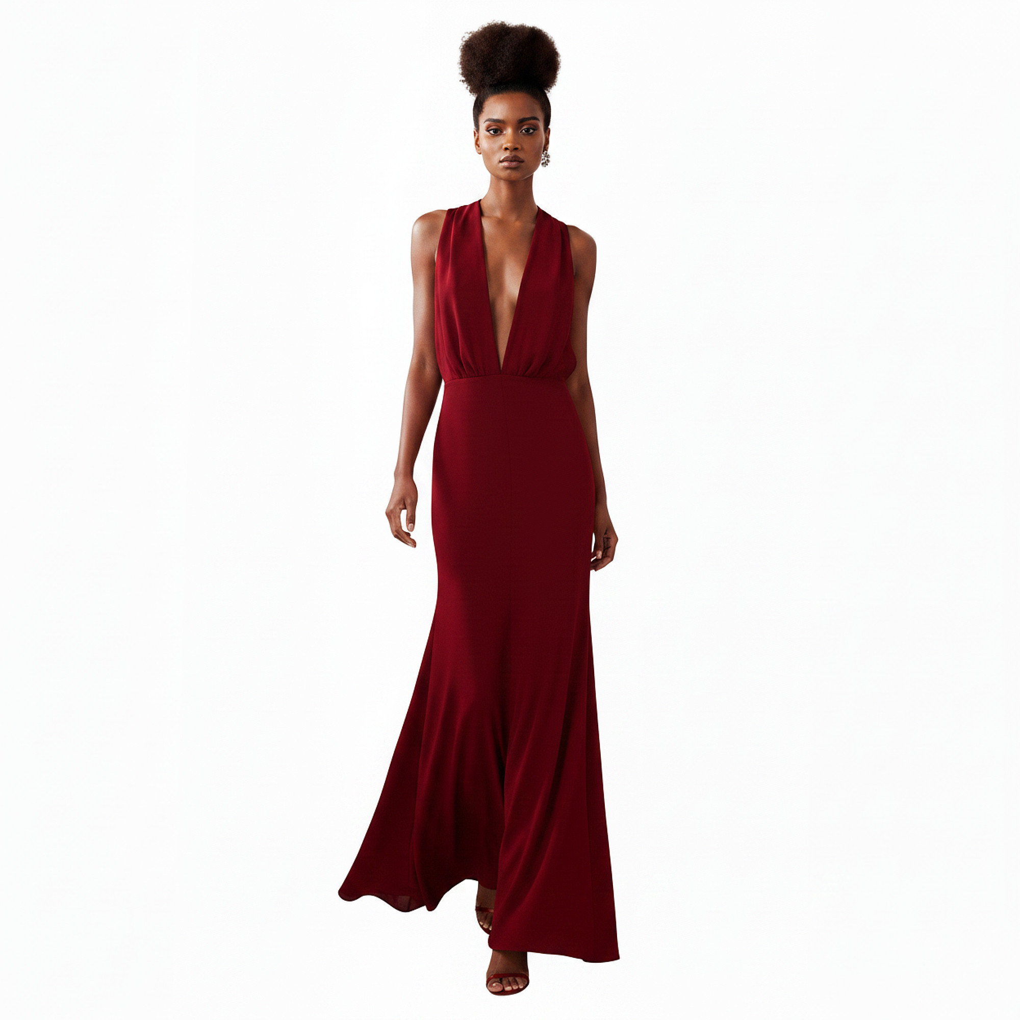 Woman wearing a deep red evening gown on a white background