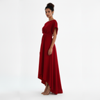 Woman wearing a red dress on a white background