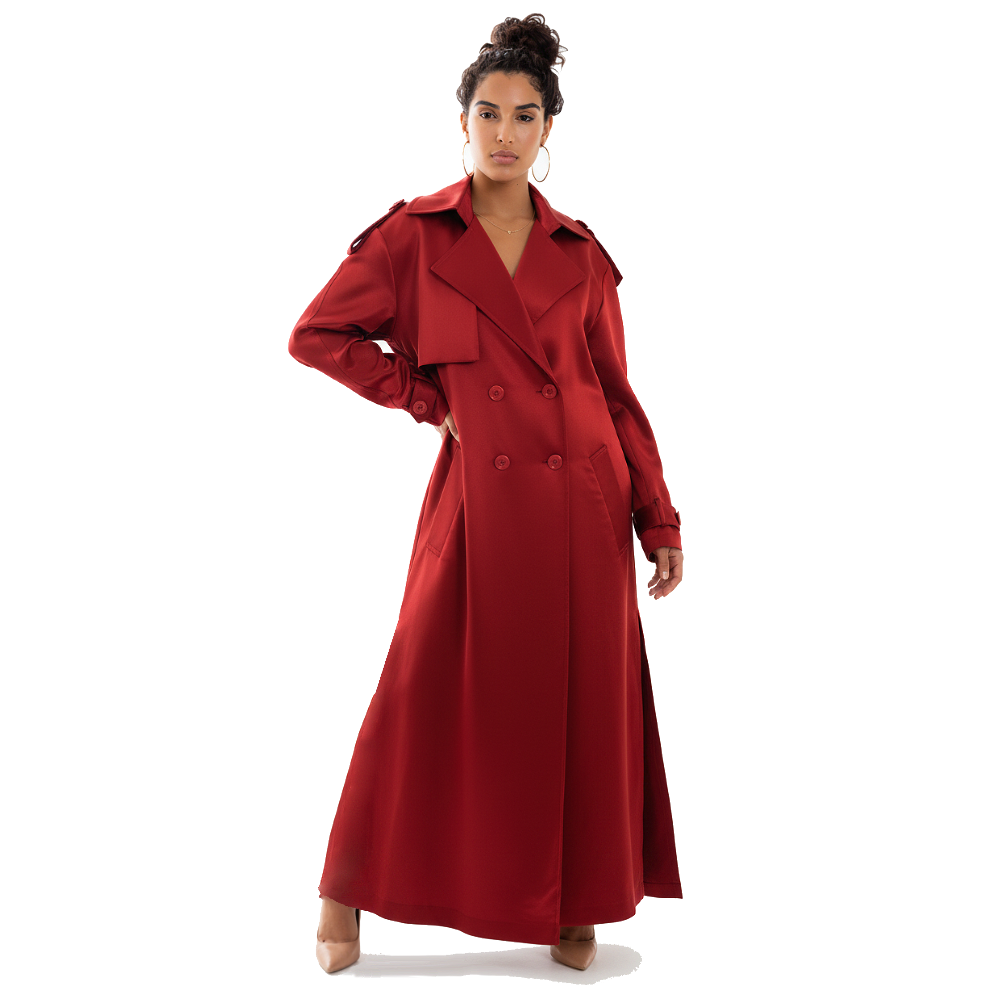 Woman wearing a long red coat on a white background