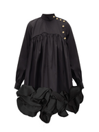 Model wearing a Maison Aria Dress