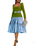 Model wearing a Maison Aria Dress