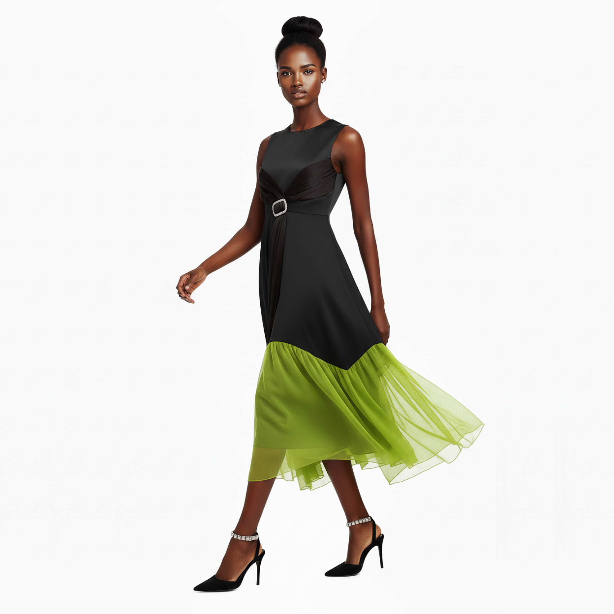 Woman wearing a black and green dress on a white background