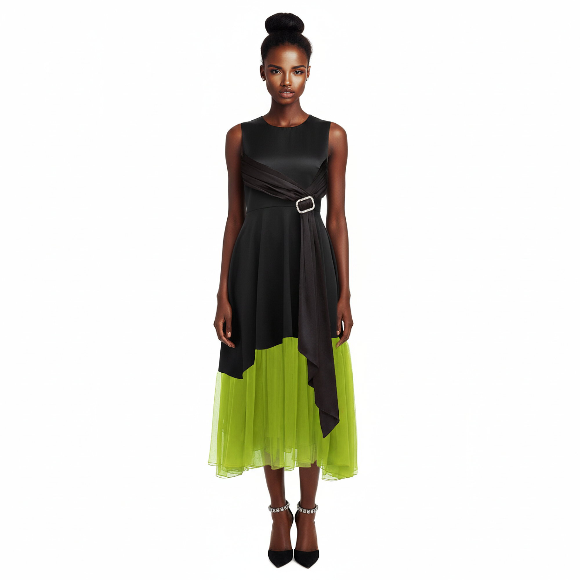 Woman wearing a black and green dress on a white background
