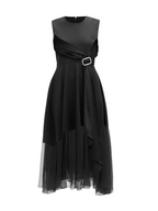 Model wearing a Maison Aria Dress