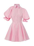 Model wearing a Maison Aria Dress