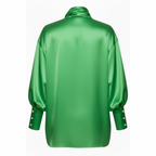 Green satin shirt on a white background