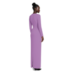 Woman wearing a long purple dress on a white background
