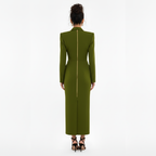 Green dress with a gold zipper on a white background