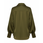 Green satin shirt on a white background