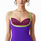 Purple swimsuit with pink and black patterned top on a white background