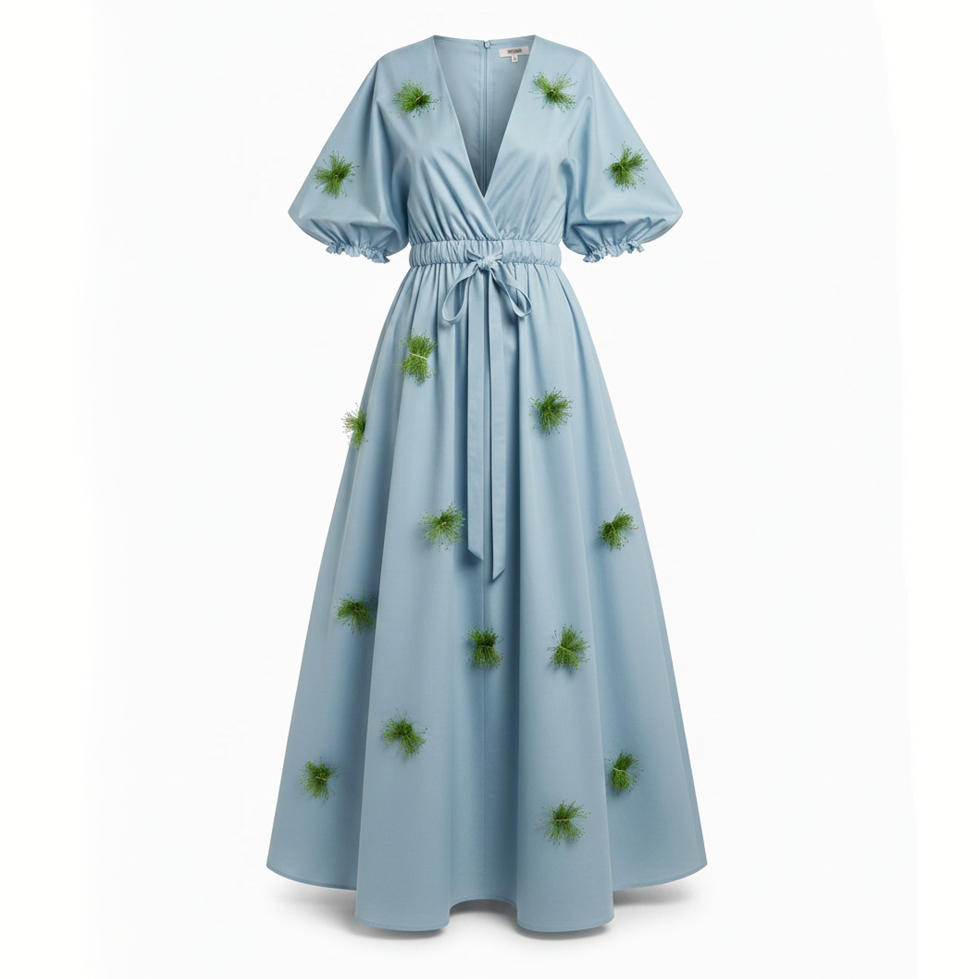 Light blue dress with green floral patterns on a white background