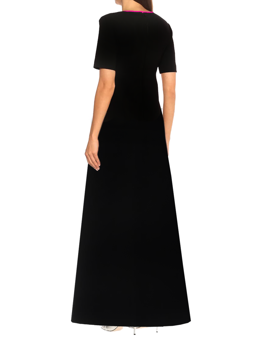 Model wearing a Maison Aria Dress