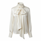 White blouse with a large bow tie on a white background