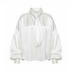 White blouse with a tie detail on a white background