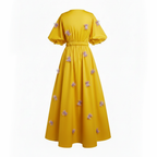 Yellow dress with floral embellishments on a white background